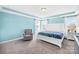 Bright main bedroom with neutral colors, tray ceiling, and large windows at 133 W Neel Ranch Rd, Mooresville, NC 28115