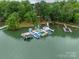 Aerial view of boat docks and shoreline at 134 Lawrence Tee Ln, Mooresville, NC 28117