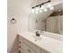 Bright bathroom features white vanity, large mirror with unique lighting, and tub-shower combo at 134 Lawrence Tee Ln, Mooresville, NC 28117