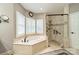 Bathroom boasts a soaking tub and a glass-enclosed shower at 134 Lawrence Tee Ln, Mooresville, NC 28117