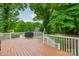 Spacious wooden deck with white railing, ideal for outdoor grilling and entertaining at 134 Lawrence Tee Ln, Mooresville, NC 28117