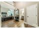 Spacious foyer featuring hardwood floors, high ceilings, and an open floor plan at 134 Lawrence Tee Ln, Mooresville, NC 28117