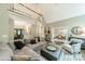 Open concept living room with high ceilings, a loft view, and a seamless flow to dining room at 134 Lawrence Tee Ln, Mooresville, NC 28117