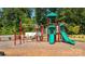 Outdoor playground with slide and climbing equipment for children in a safe, fun environment at 135 Way Cross Ln, Troutman, NC 28166