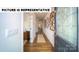 Inviting hallway with hardwood floors, decorative wall art and a stained glass front door at 143 Way Cross Ln, Troutman, NC 28166