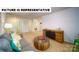 Cozy living room with a comfortable sofa, storage cabinet, and neutral color palette for a relaxing ambiance at 143 Way Cross Ln, Troutman, NC 28166
