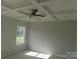 Bedroom with modern tray ceiling, ceiling fan and large windows for natural light at 144 Mason Tanner Ct, Rock Hill, SC 29730
