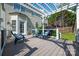 Back deck featuring outdoor seating and a relaxing pergola with view of back yard at 15406 Pepperwood Ct, Huntersville, NC 28078
