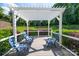 Deck featuring outdoor seating and a relaxing pergola at 15406 Pepperwood Ct, Huntersville, NC 28078