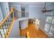 Second floor of home showing hardwood floors, living room, staircase and kitchen at 15406 Pepperwood Ct, Huntersville, NC 28078