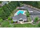 Aerial view of community pool, clubhouse, boat storage and adjacent green space at 160 Fernbrook Dr, Mooresville, NC 28117