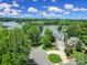 Picturesque lakeside community with stunning water views and lush greenery, perfect for serene living at 160 Fernbrook Dr, Mooresville, NC 28117