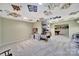 Organized basement with storage solutions and an entertainment area, ideal for hobbies and recreation at 160 Fernbrook Dr, Mooresville, NC 28117