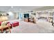 Comfortable basement with a sitting area, entertainment setup, and organized storage in the background at 160 Fernbrook Dr, Mooresville, NC 28117