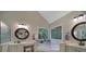 Bright bathroom with double sink vanity, soaking tub, and large window offering natural light at 160 Fernbrook Dr, Mooresville, NC 28117