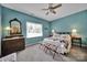 Comfortable bedroom featuring a ceiling fan, and neutral colored walls at 160 Fernbrook Dr, Mooresville, NC 28117