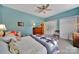 Inviting bedroom with plush carpet, ceiling fan, lots of closet space and natural light at 160 Fernbrook Dr, Mooresville, NC 28117
