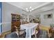 Bright dining room with natural light, hardwood floors, and stylish decor, perfect for elegant gatherings at 160 Fernbrook Dr, Mooresville, NC 28117