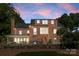 Beautiful brick home with an outdoor seating area and a well-maintained backyard at 222 E Carter St, Lincolnton, NC 28092