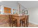 Basement bar area featuring brick accents and wooden bar stools at 222 E Carter St, Lincolnton, NC 28092