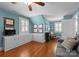 Office bedroom with natural light, hardwood floors, and custom built-in storage solutions at 222 E Carter St, Lincolnton, NC 28092