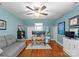 Bedroom/office space with hardwood floors, a ceiling fan, and ample natural light at 222 E Carter St, Lincolnton, NC 28092