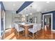 Stylish kitchen showcasing a central island with seating, gray cabinets and stainless appliances at 222 E Carter St, Lincolnton, NC 28092