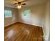 Inviting bedroom featuring hardwood floors, with lots of natural light at 224 Locust Ave, Locust, NC 28097