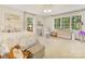 Bright and cozy bedroom with hardwood floors and an abundance of natural light at 2611 Forest Dr, Charlotte, NC 28211
