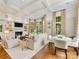 Bright living room features a fireplace, built-in shelves, and lots of natural light at 2611 Forest Dr, Charlotte, NC 28211