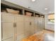 Spacious built in storage cabinets, hardwood floors and a window with natural light at 2611 Forest Dr, Charlotte, NC 28211