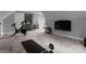 Finished bonus room featuring a fitness area, a media setup, and a cozy atmosphere at 2646 Lee Lawing Rd, Lincolnton, NC 28092