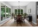 Bright dining room with large windows offering stunning views of the backyard and lots of natural light at 2646 Lee Lawing Rd, Lincolnton, NC 28092
