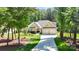 Exterior elevation of a two-story home with a front lawn and driveway at 2646 Lee Lawing Rd, Lincolnton, NC 28092