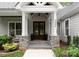 Charming home with a welcoming front entrance, stone pillars, and double doors at 2646 Lee Lawing Rd, Lincolnton, NC 28092