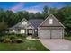 Charming craftsman home with a landscaped front yard and two-car garage offers great curb appeal at 2646 Lee Lawing Rd, Lincolnton, NC 28092