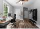 Home office with a desk, chair, workout machine, and a window overlooking the yard at 2646 Lee Lawing Rd, Lincolnton, NC 28092
