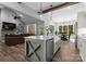 Open-concept kitchen with a large island, modern appliances, and a seamless flow to the dining at 2646 Lee Lawing Rd, Lincolnton, NC 28092