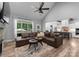 Open concept living room features hardwood floors, vaulted ceilings, and flows into the kitchen at 2646 Lee Lawing Rd, Lincolnton, NC 28092