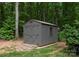 A backyard shed with a concrete foundation and shingled roof at 2646 Lee Lawing Rd, Lincolnton, NC 28092
