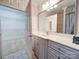 Bathroom with white vanity and view into closet at 3015 Hamptonbrook Dr, Gastonia, NC 28056
