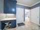 Kitchen area featuring built-in desk and tile flooring at 3015 Hamptonbrook Dr, Gastonia, NC 28056