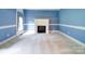 Bright living room with fireplace and white trim at 3015 Hamptonbrook Dr, Gastonia, NC 28056