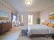 Main bedroom with wallpaper and neutral color palette at 3015 Hamptonbrook Dr, Gastonia, NC 28056