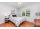 Cozy bedroom with hardwood floors, natural light, and a neutral color palette at 31470 Royal Tern Ln, Indian Land, SC 29707