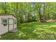 Large, well-maintained backyard with storage shed and ample green space at 4025 Cherrybrook Dr, Mint Hill, NC 28227