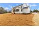 Expansive backyard featuring a walk out deck and a freshly landscaped garden at 4095 Kingfisher Dr, York, SC 29745