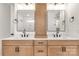 Bathroom with dual vanities, white countertops, and framed mirrors at 4095 Kingfisher Dr, York, SC 29745