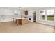 Modern kitchen with an island, sleek countertops, and ample cabinet space at 4095 Kingfisher Dr, York, SC 29745