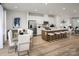 Open concept kitchen and dining area with hardwood floors, stainless steel appliances, and modern decor at 5030 Grain Orchard Rd # 3025C, Indian Trail, NC 28079